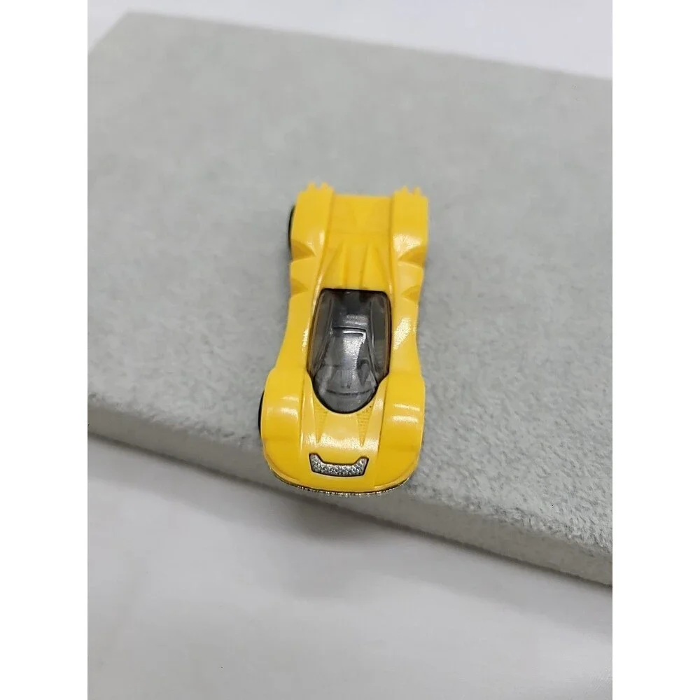Hot Wheels Teegray Yellow Exotic Sports Car with Chrome Wheels 1:64